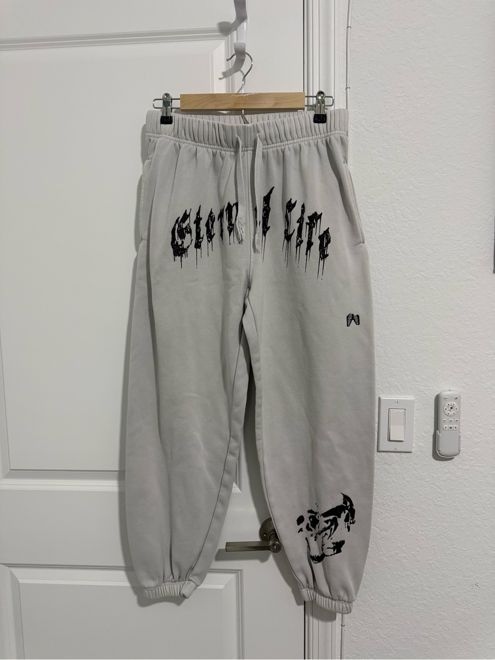 Rawgear Light Gray Sweatpants with Black Drip Script